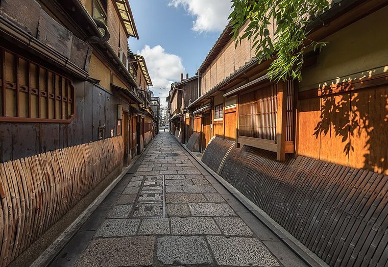 Traditional Kyoto street with facades converging to a vanishing point