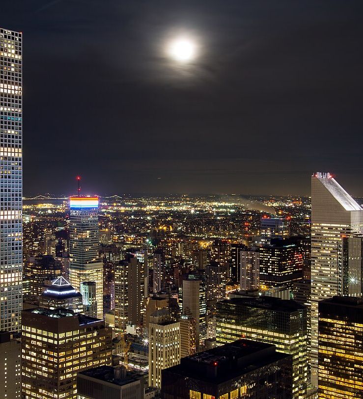 Manhattan skyscrapers at night seen from an observation deck