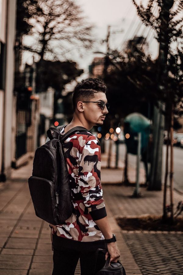 Man looking away from the camera over his shoulder in a candid street moment